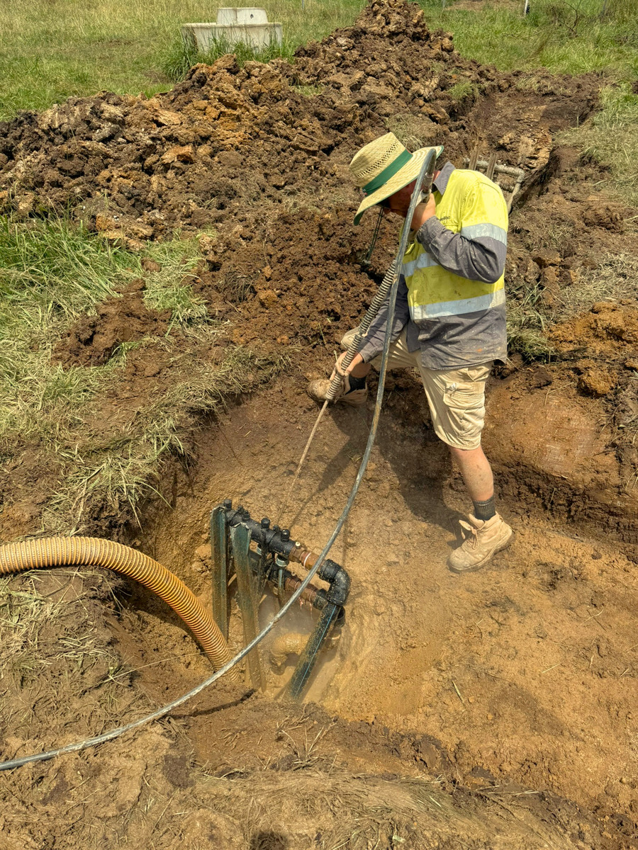 GreenVac operator using hydrovac equipment to excavate around underground infrastructure